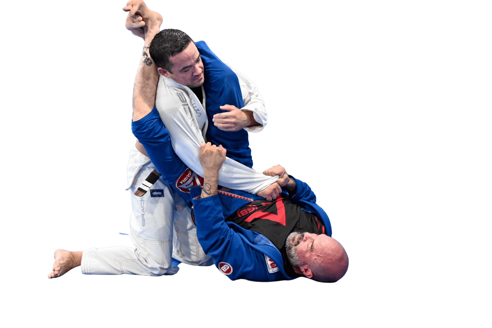 Adult students training Brazilian Jiu Jitsu during a live martial arts class at Gracie Barra Argyle in Argyle, Texas. Our adult program focuses on technique, control, fitness, and practical self defense in a structured training environment.