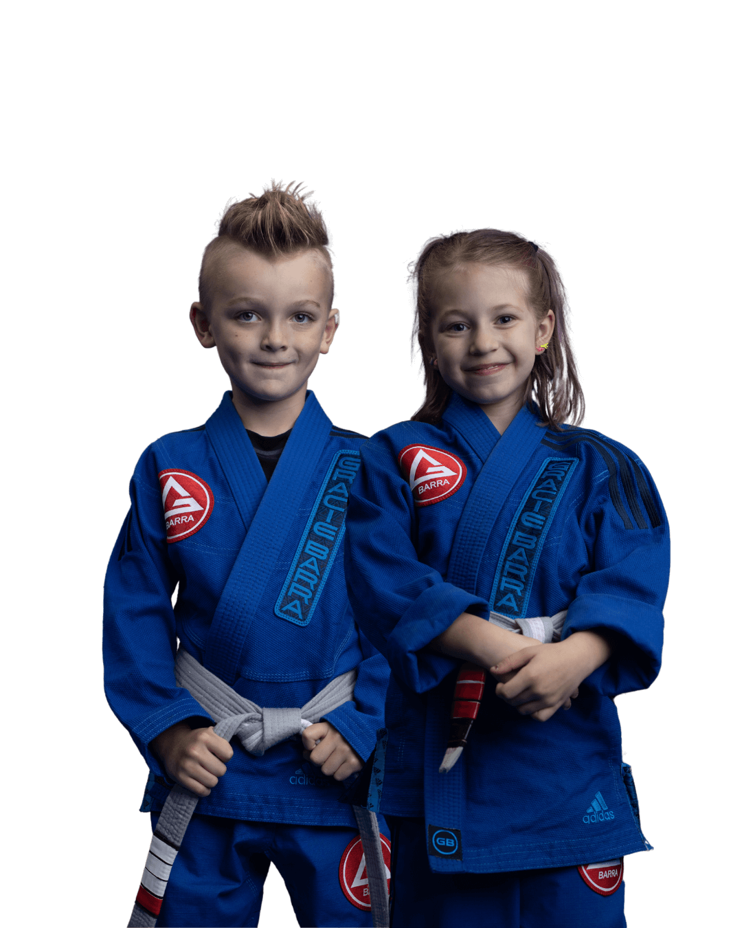 Two children in blue gis participating in kids Brazilian Jiu-Jitsu classes at Gracie Barra Argyle in Argyle TX